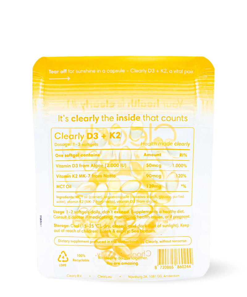 Clearly D3 + K2 supplement bottle with white cap and label, shown from the back.
