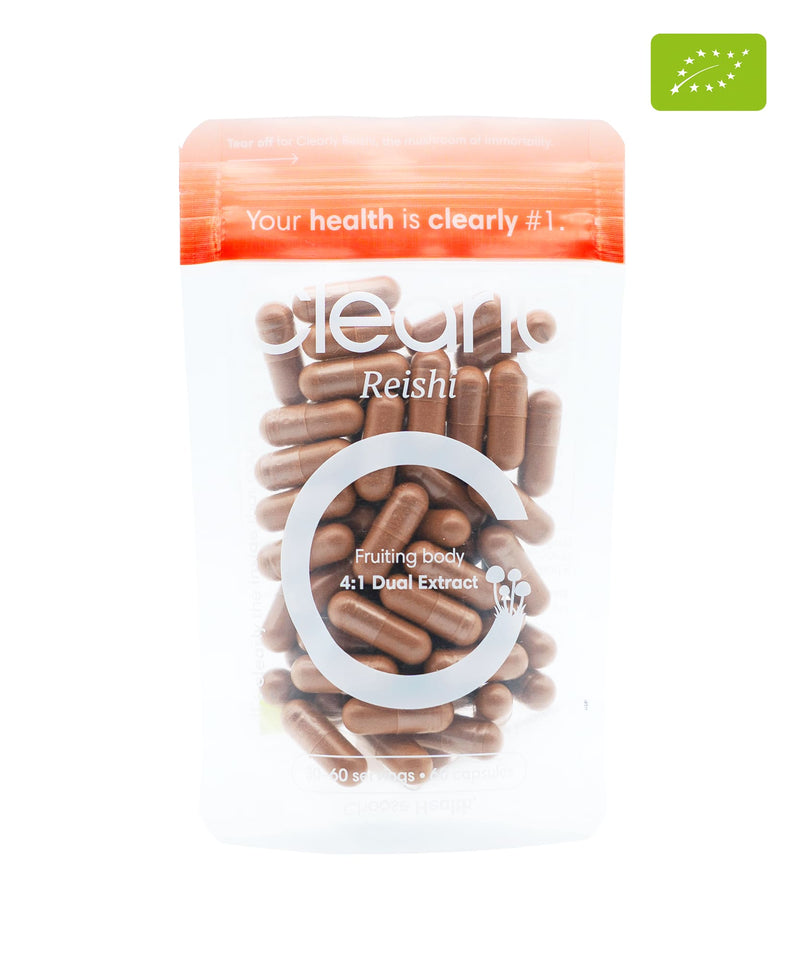 Organic Reishi capsules by Clearly, showing a bottle of herbal supplement capsules on a white background.